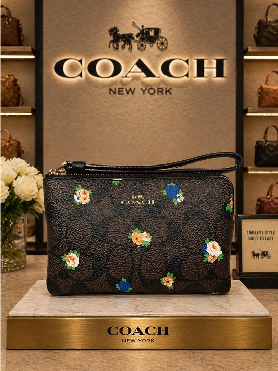 Coach Handbags - Coach Corner Zip Wristlet Brown Signature Canvas Vintage Mini Rose Print